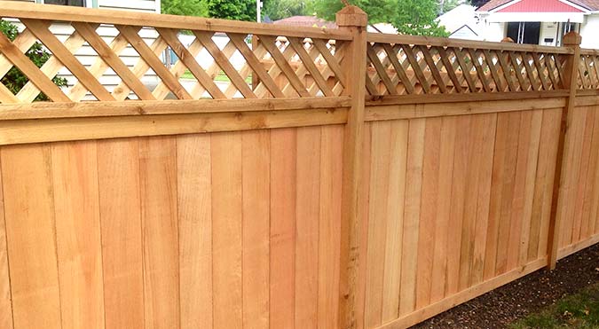 wood privacy fence with lattice top