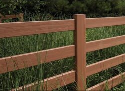 brown post and rail vinyl fence with woodgrain texture